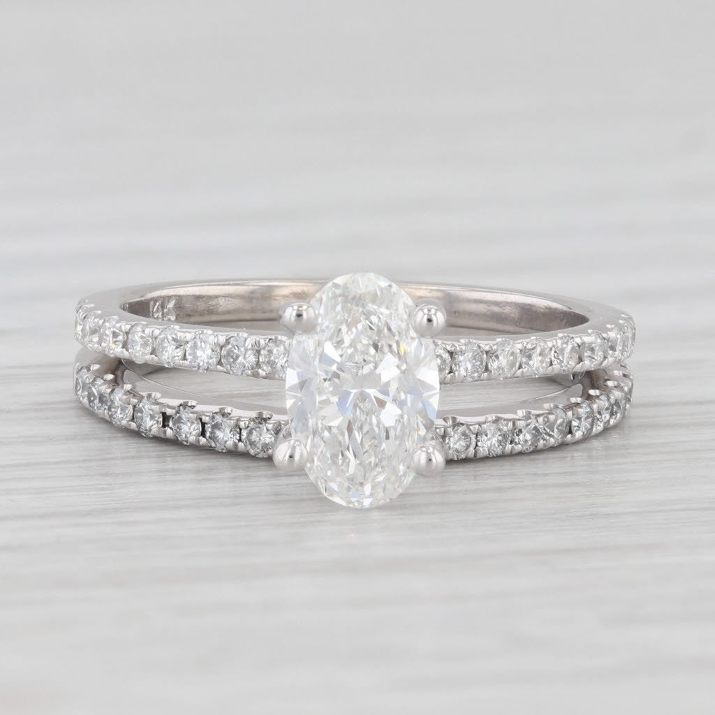 1.45ct Oval Burma Ruby 0.55ct Diamond Halo Ring — GIA Certified, Platinum