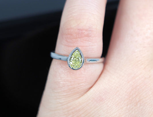 0.86ct Pear Modified Brilliant Fancy Yellow Diamond Engagement Ring — GIA Certified, Platinum